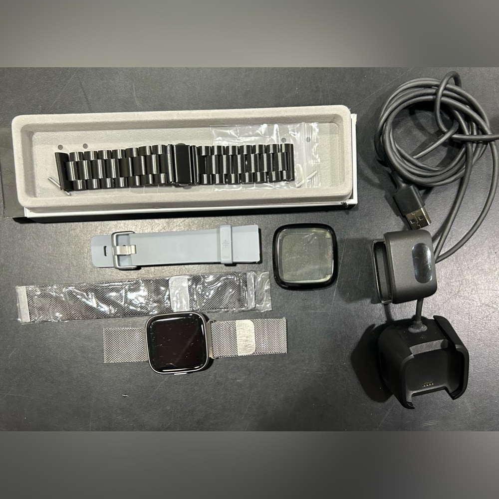NOT FOR SALE. Fitbit Versa 2 and Accessories